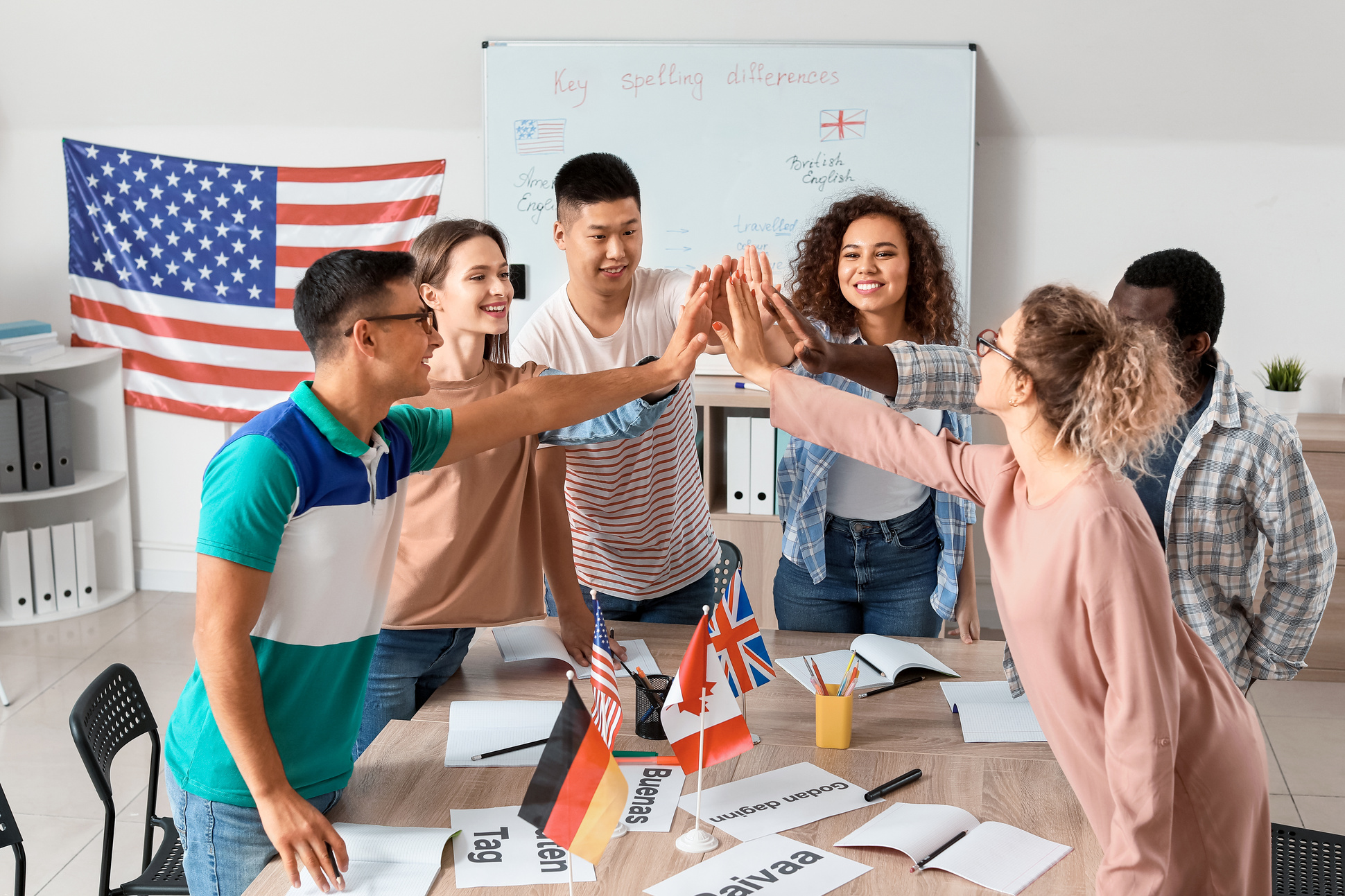 Students of Language School Putting Hands Together 